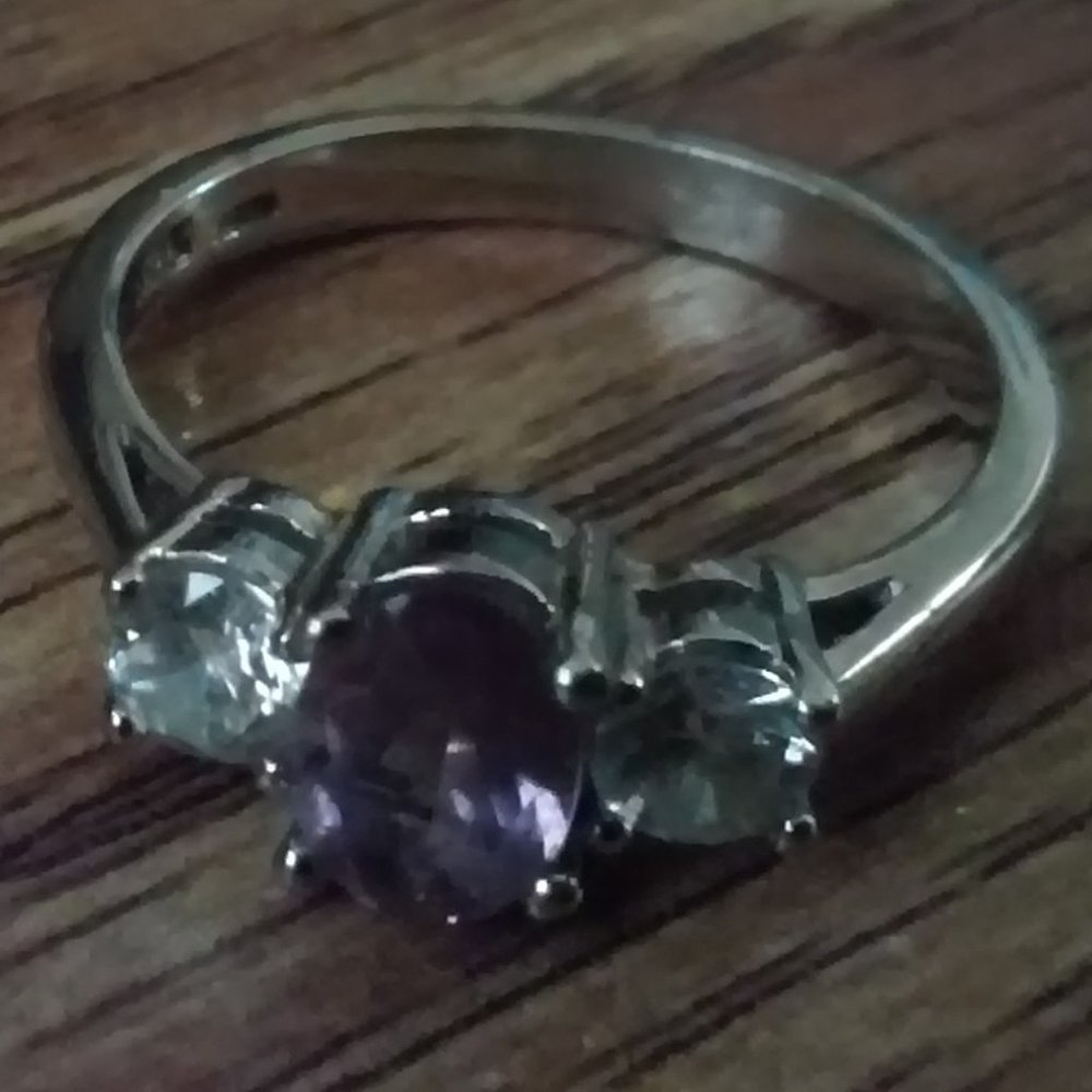 Silver Ring Size 6.5 to 7 With 3 Stones 1 Purple Stone 2 Clear Stones